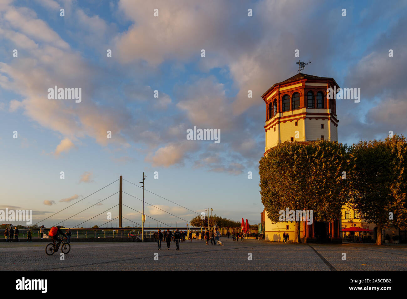 Rhine Riverside Outdoor scenery of people on promenade riverside of Rhine River at ...