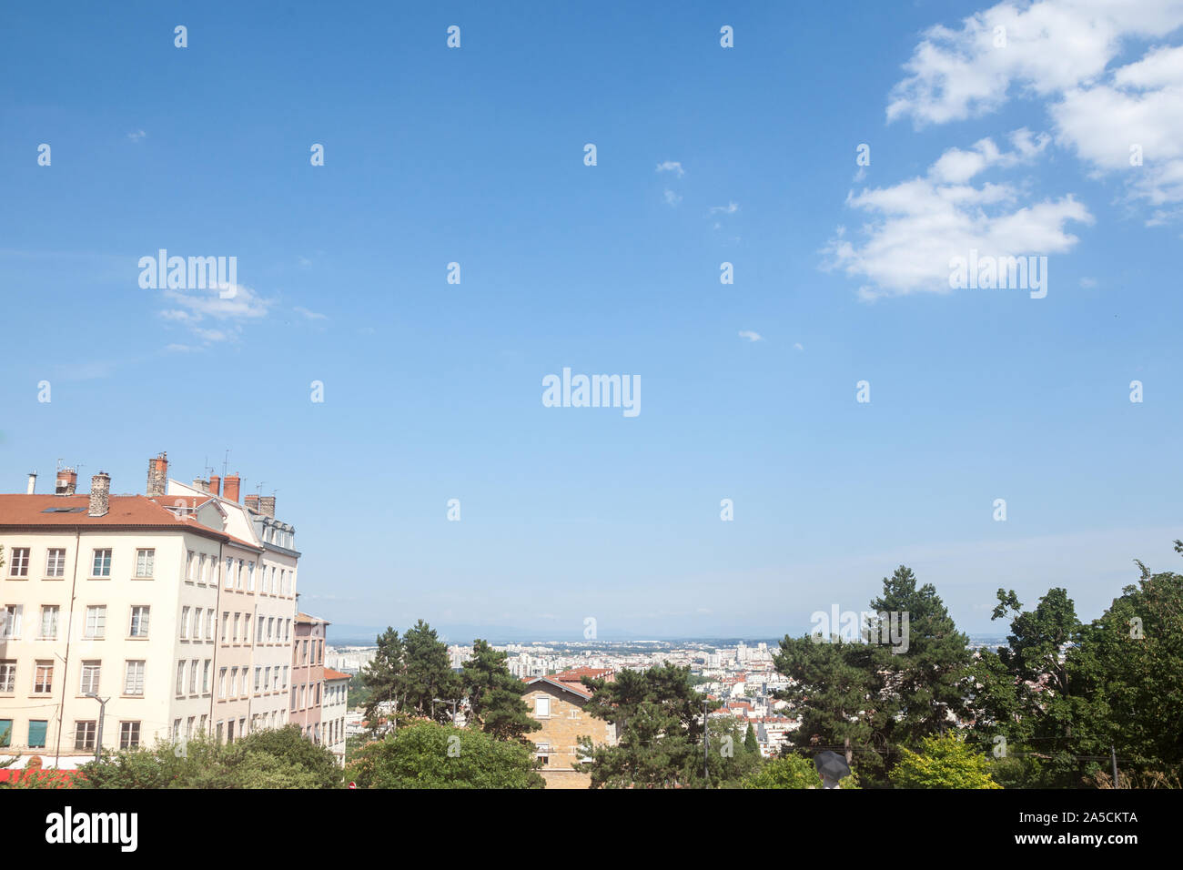 Aerial panoramic view of Lyon seen from the Colline de la Croix-Rousse Hill taken during a sunny afternoon. Lyon is the second biggest city of France, Stock Photo