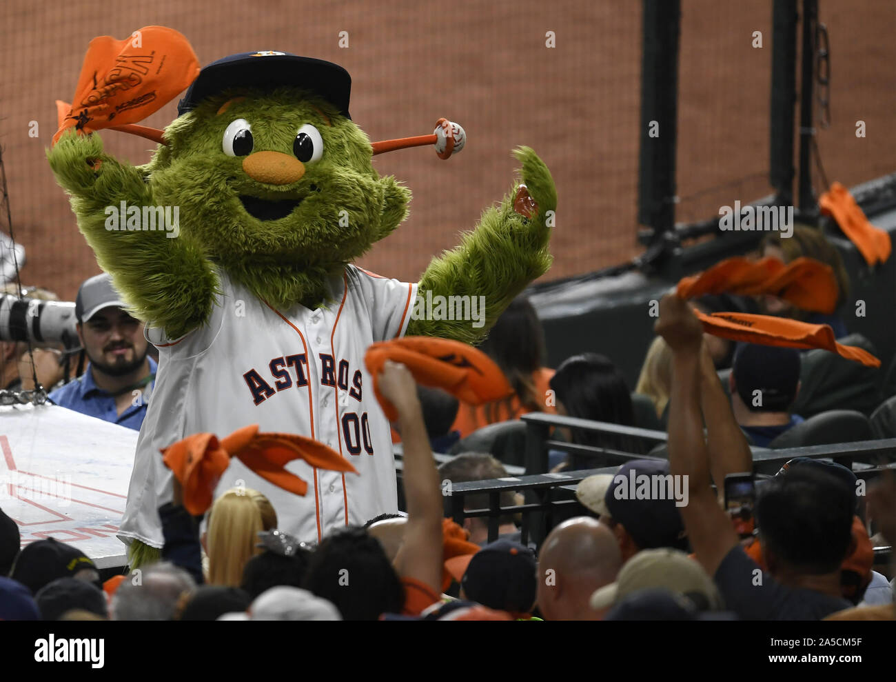 Houston, United States. 19th Oct, 2019. Houston Astros mascot Orbit cheers  with fans against the New York Yankees in the fourth inning in Game 6 of  the American League Championship Series at