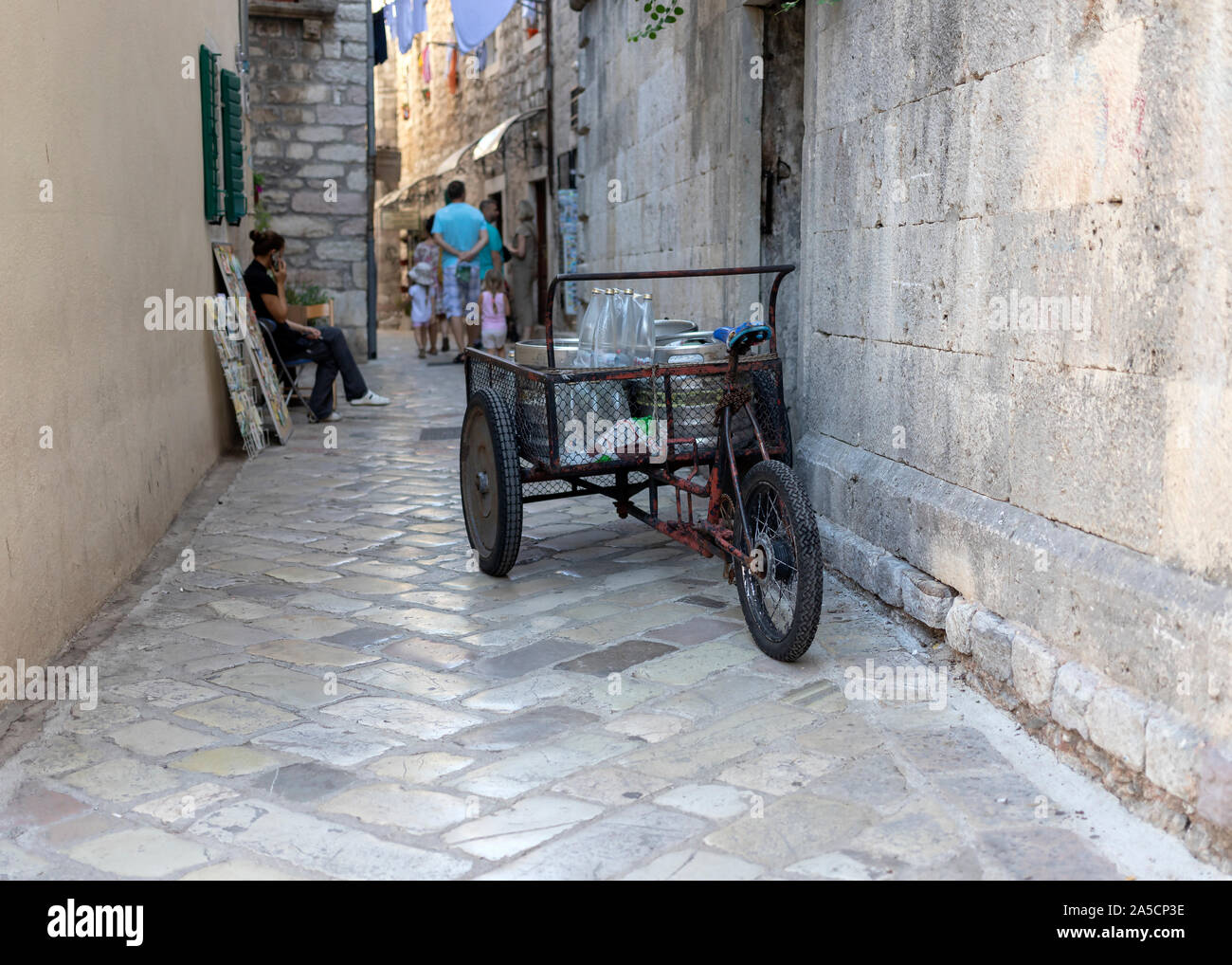 Montenegro, Sep 16, 2019: Delivery tricycle parked on the street in old town of Kotor Stock Photo