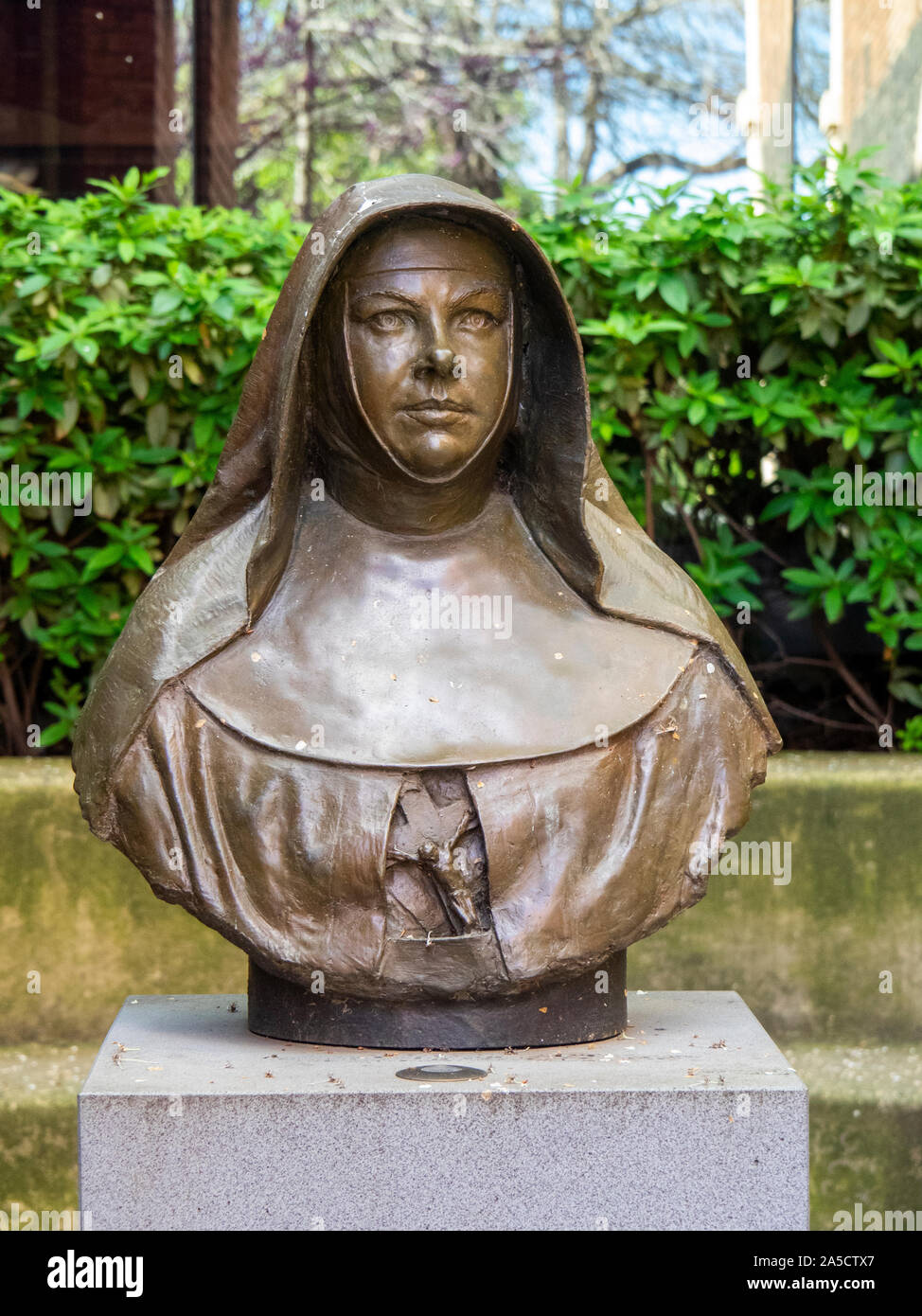 Bronze bust of St Mary MacKillop in the garden of Mary MacKillop Heritage Centre East Melbourne Victoria Australia. Stock Photo