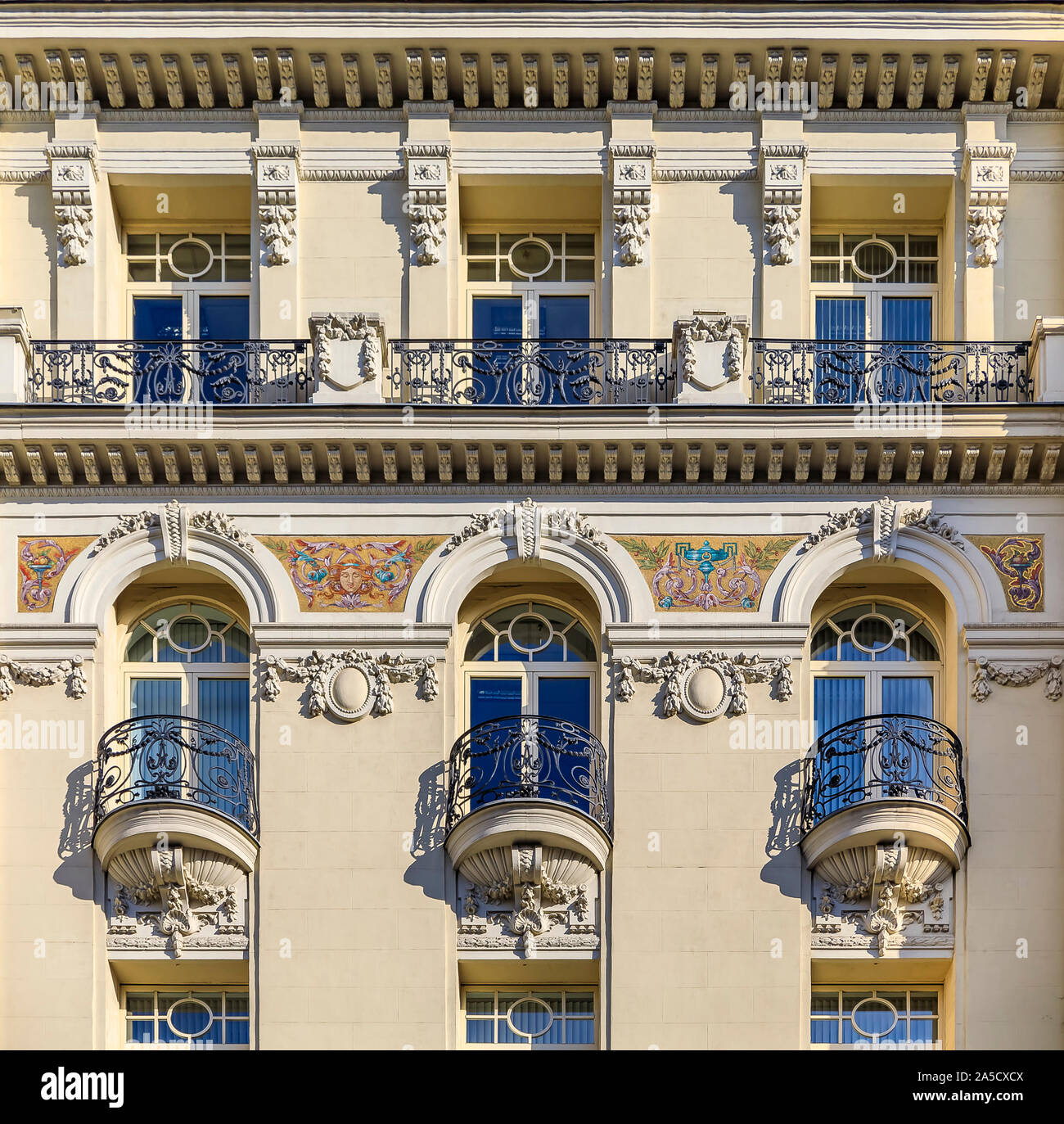 Beautiful traditional residential buildings with ornate metal balconies ...