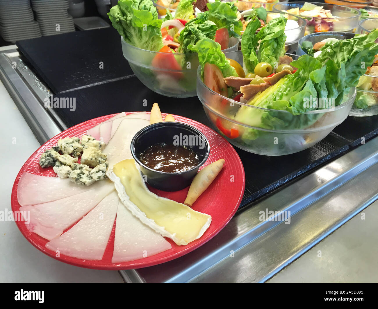 Variety of the spanish cheeses and salads for breakfast in Spain Stock