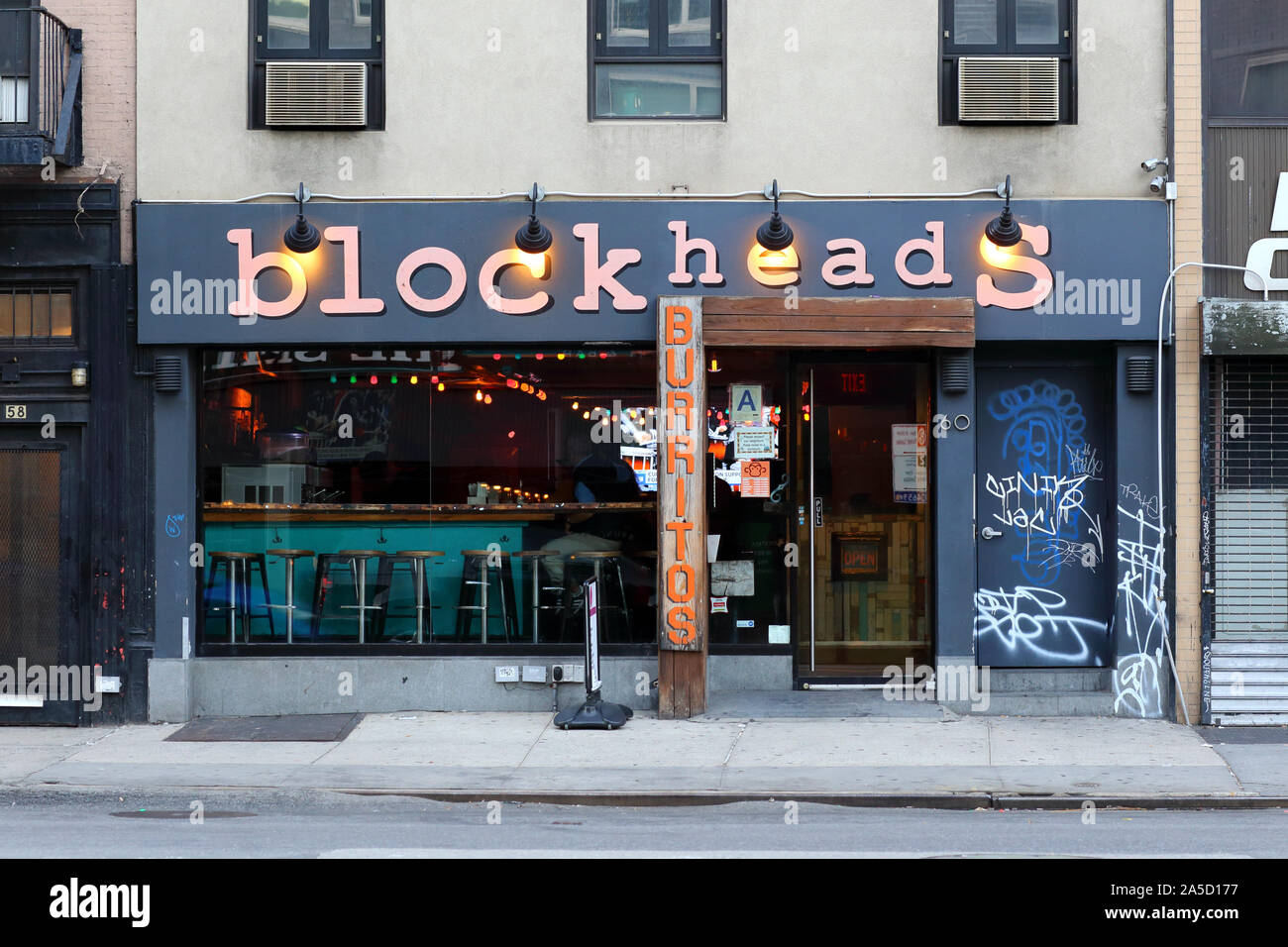 [historical storefront] Blockheads, 60 Third Avenue, New York, NYC storefront photo of a bar in the East Village neighborhood of Manhattan. Stock Photo