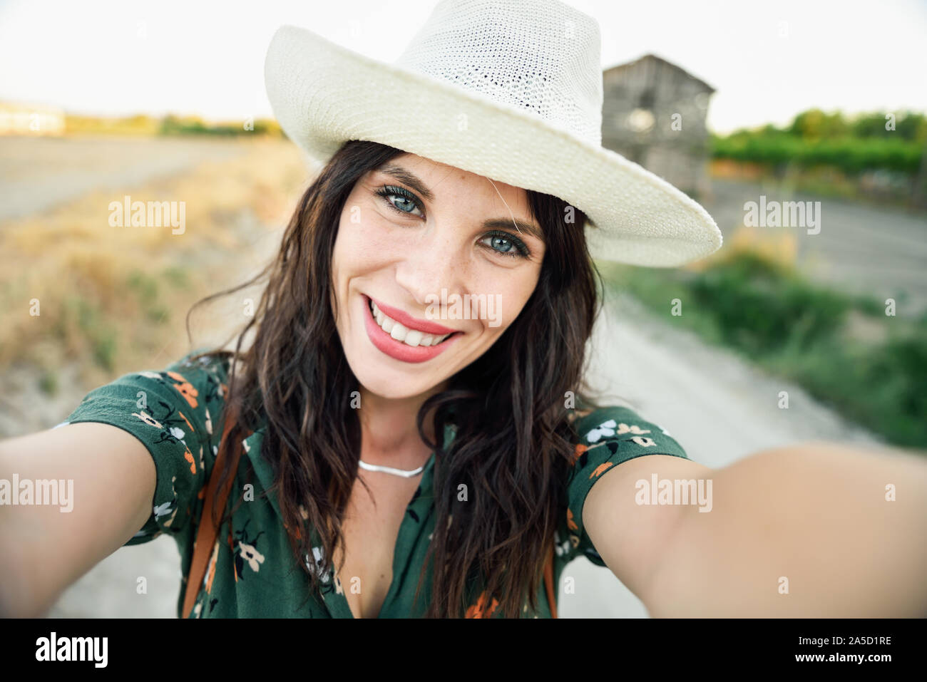 Hiker young woman taking a selfie photograph outdoors Stock Photo - Alamy