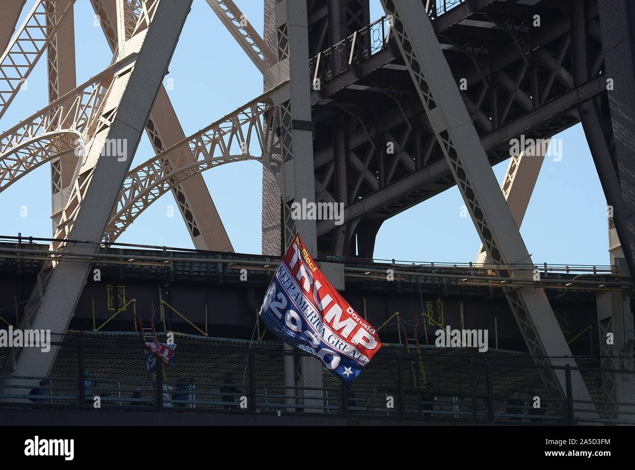 Long Island City, NY, USA. 19th Oct, 2019. Trump flag in attendance for Bernie's Back Rally for Bernie Sanders Presidential Campaign, Queensbridge Park, Long Island City, NY October 19, 2019. Credit: Kristin Callahan/Everett Collection/Alamy Live News Stock Photo