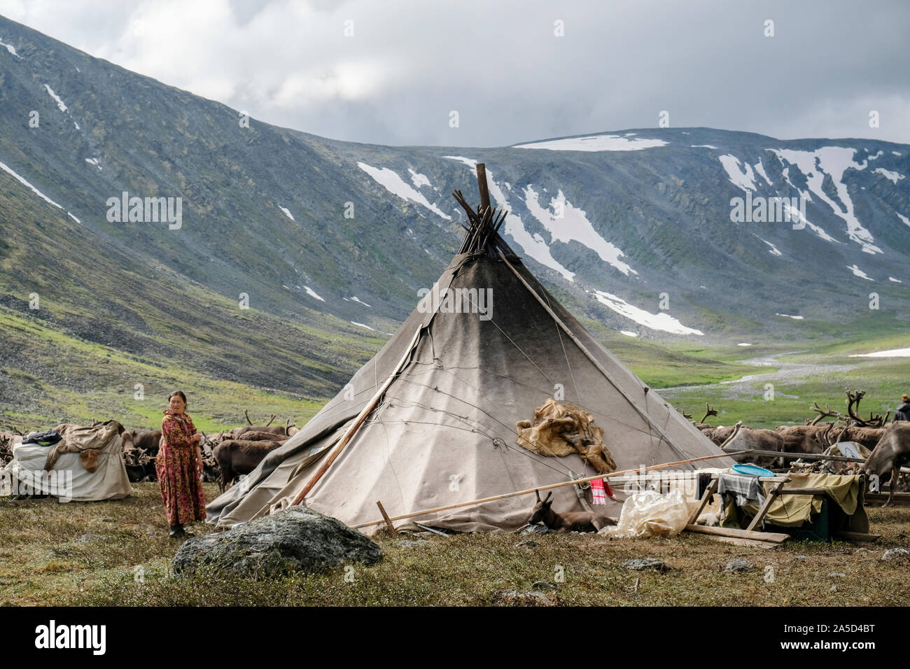A Nenet woman at a camp site in Siberia, Russia Stock Photo