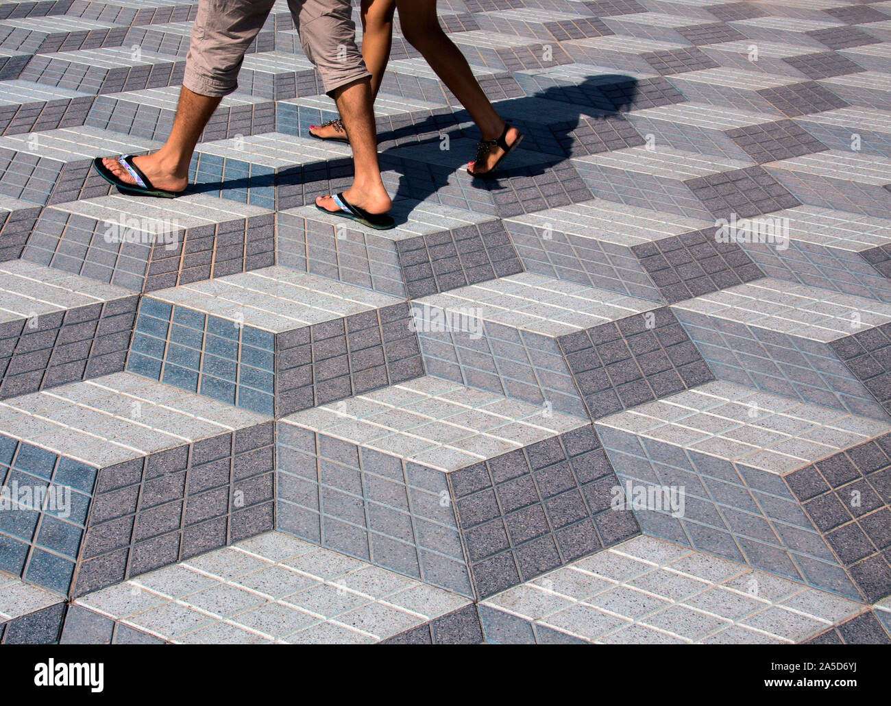 Alicane. Spain. 07.01.12. Floor tile design in the style of M.C. Escher in Alicante in the Costa Blanca region of Spain. Stock Photo