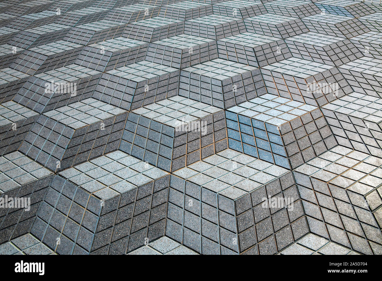 Alicante. Spain. 07.01.12. Floor tile design in the style of M.C. Escher in Alicante in the Costa Blanca region of Spain. Stock Photo