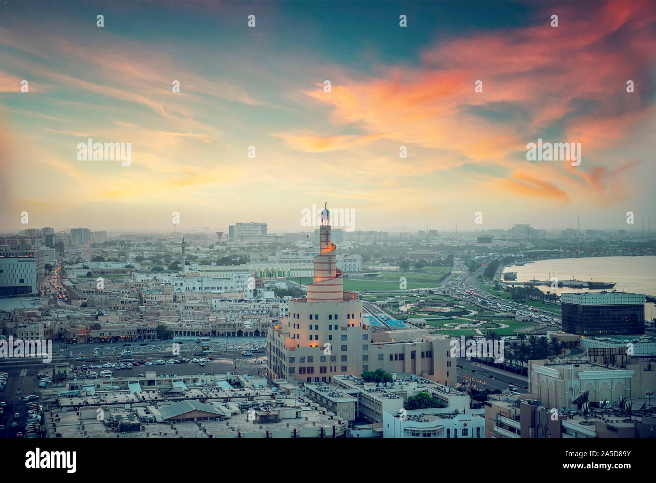 Ariel View of Doha City with Iconic Doha Fanar Mosque sunset time Stock Photo