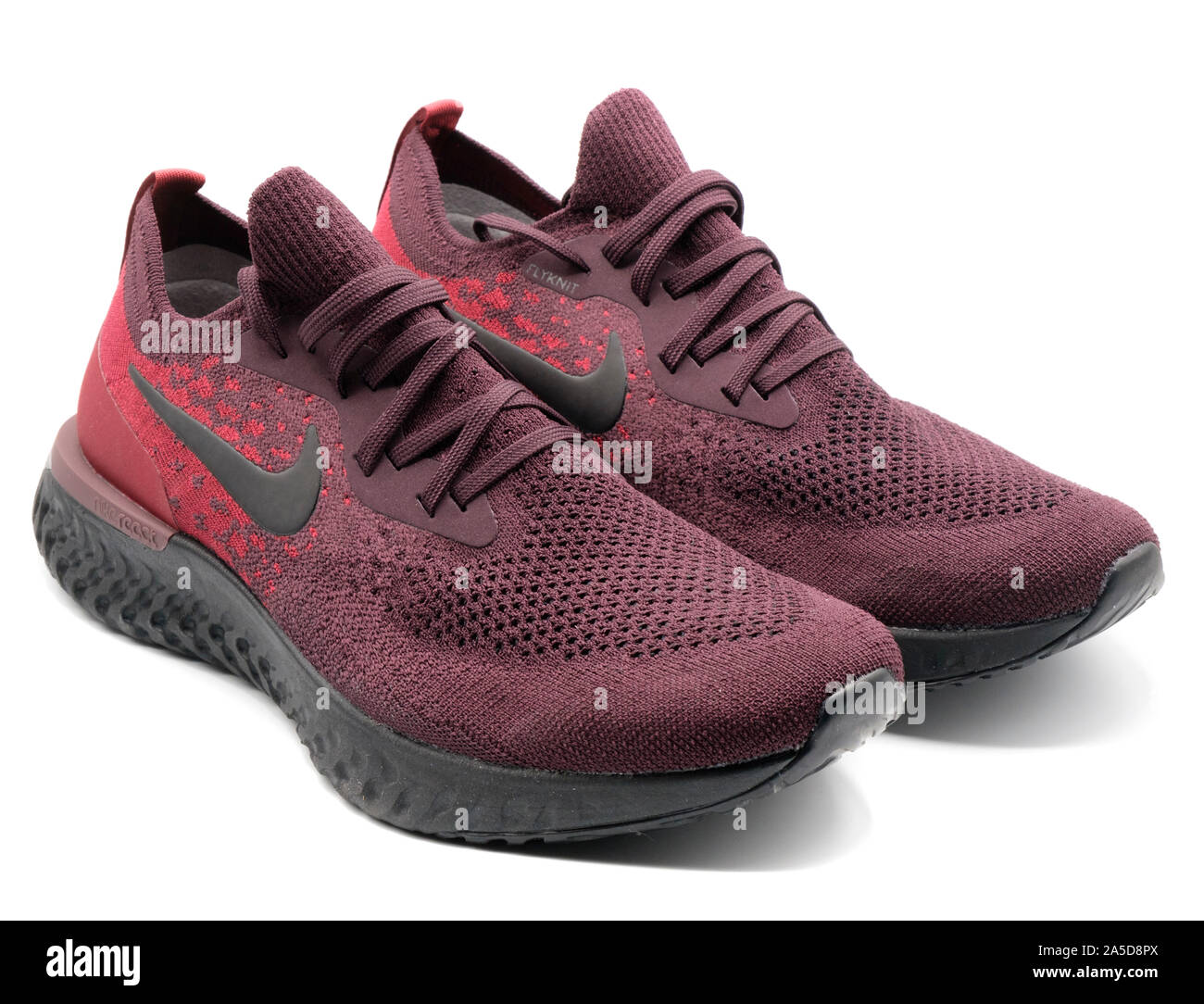 Nike Epic React red running shoes cutout isolated on white background Stock  Photo - Alamy