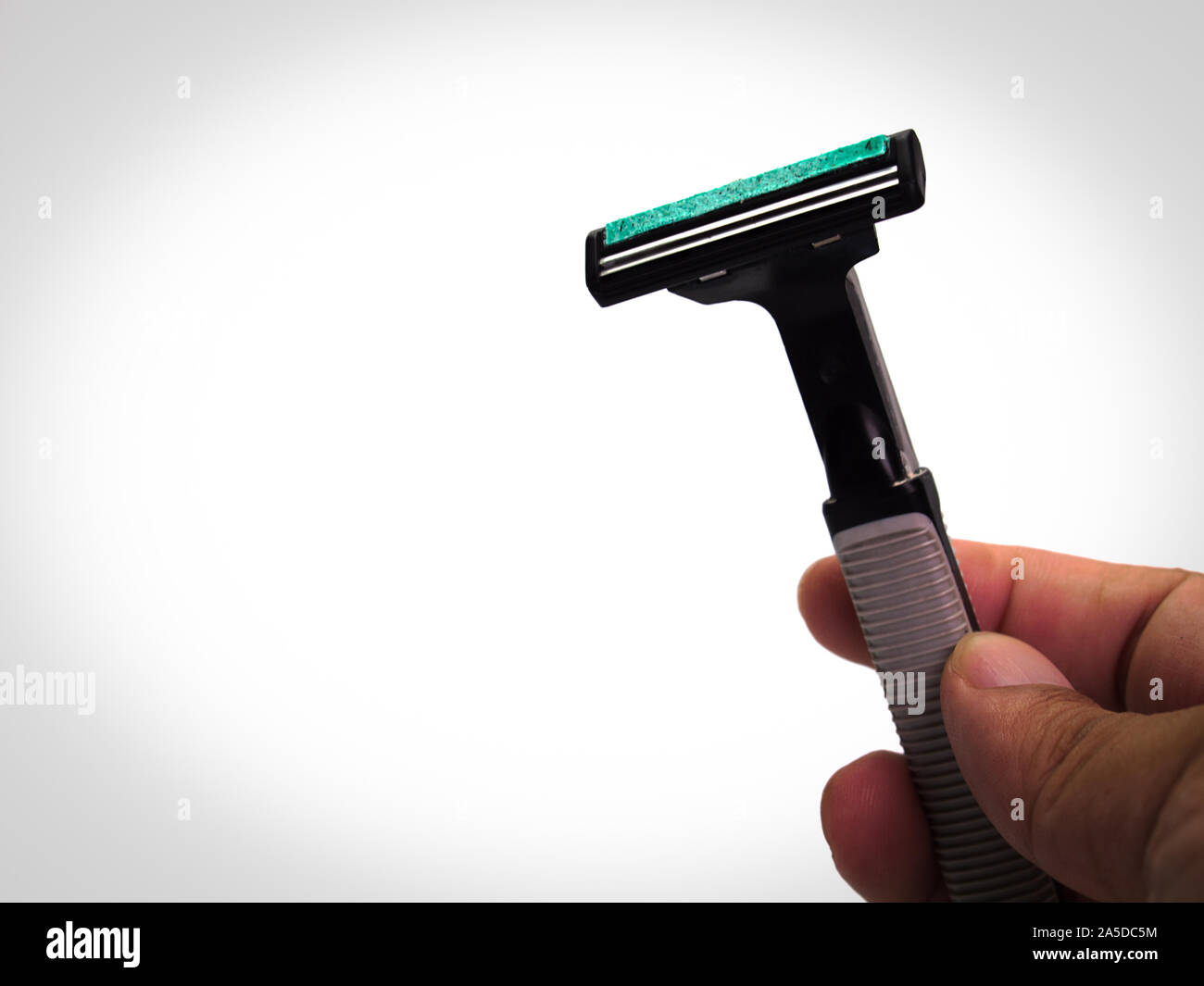 Shaving razor on a white background. Stock Photo