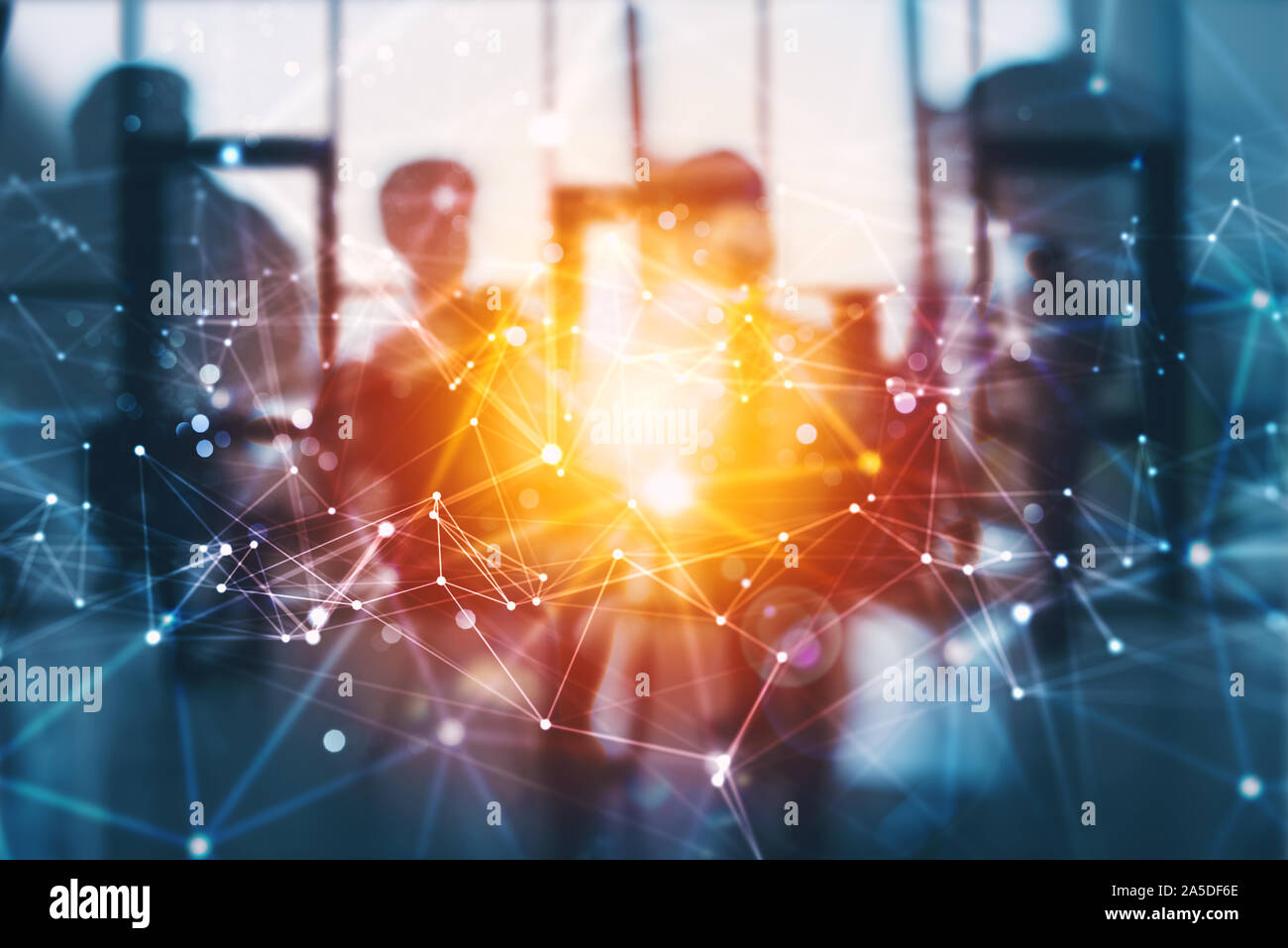 Silhouette of business people work together in office. Concept of teamwork and partnership. double exposure with network effects Stock Photo