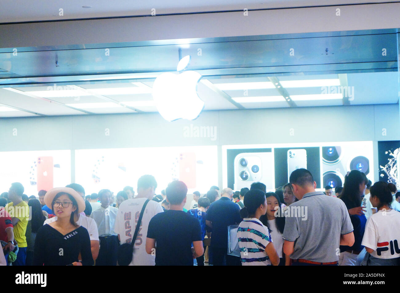 Shenzhen, China: Apple's mobile phone stores are lining up in a long line. Apple fans are preparing to buy the new iPhone 11 Stock Photo