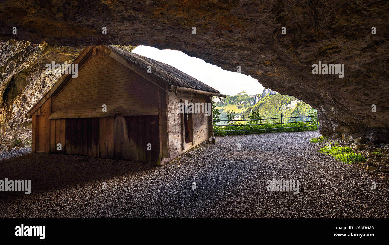 Historic cabin in the Wildkirchli cave in the Appenzell region of Switzerland Stock Photo