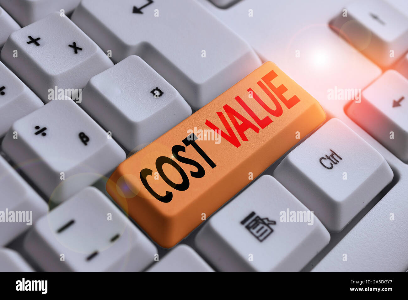 Handwriting text writing Cost Value. Conceptual photo The amount that usualy paid for a item you buy or hiring a demonstrating White pc keyboard with Stock Photo