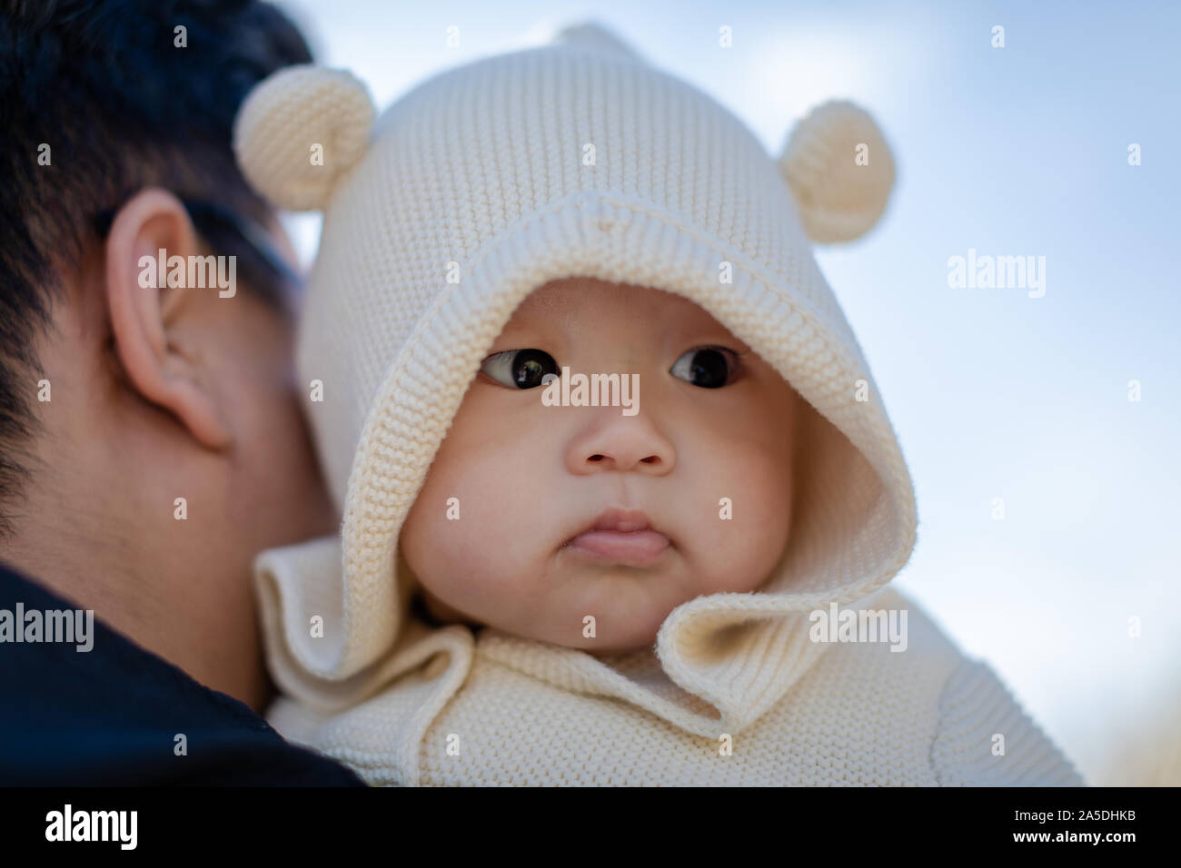 Portrait of adorable 4 months baby boy in the autumn season, outdoors Stock Photo