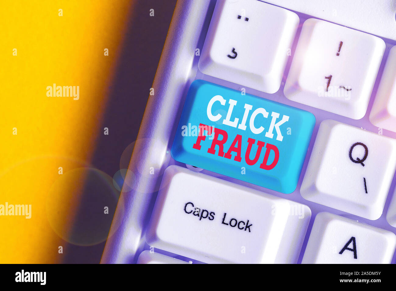 Writing note showing Click Fraud. Business concept for practice of repeatedly clicking on advertisement hosted website White pc keyboard with note pap Stock Photo
