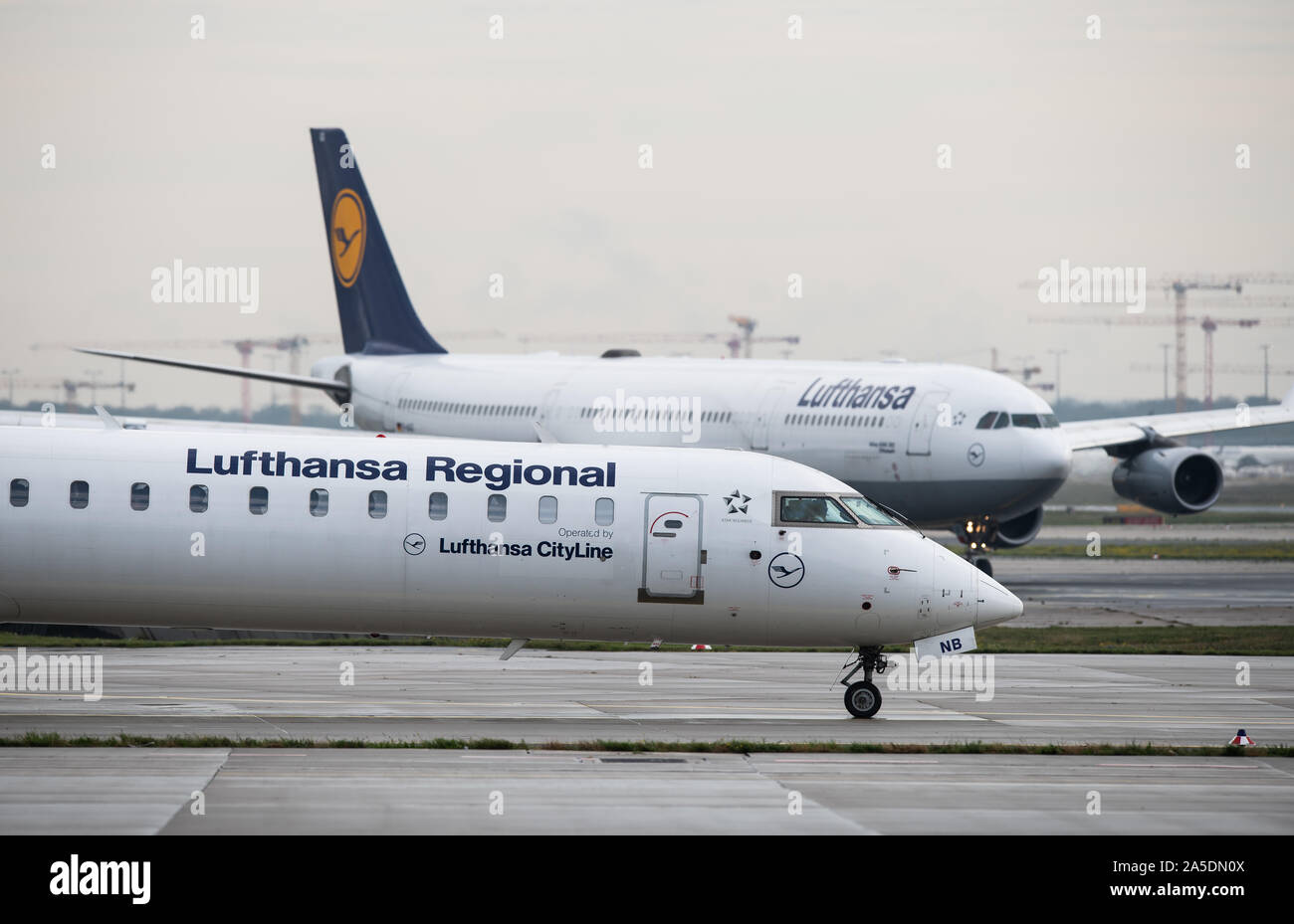 Frankfurt Germany th Oct 19 A Lufthansa Cityline Passenger Aircraft Front Is Taxiing Towards The Runway