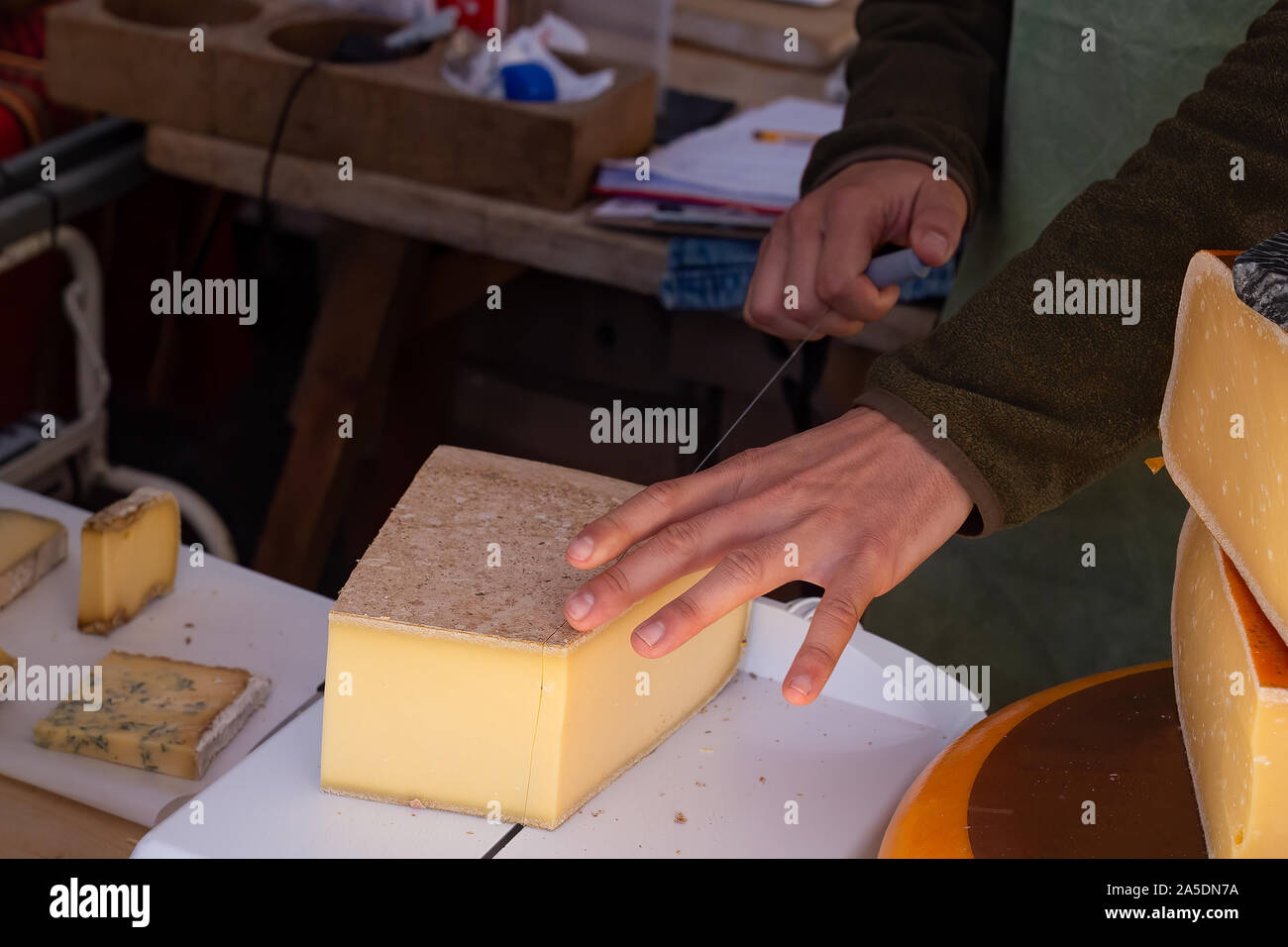 Cutting cheese with wire hires stock photography and images Alamy