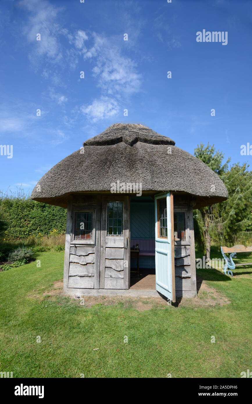 Thatched Garden Kiosk, Wooden Shed,  Hut, Pavilion, or Gazebo at the Garden of Heroes & Villains, Stratford-upon-Avon Stock Photo