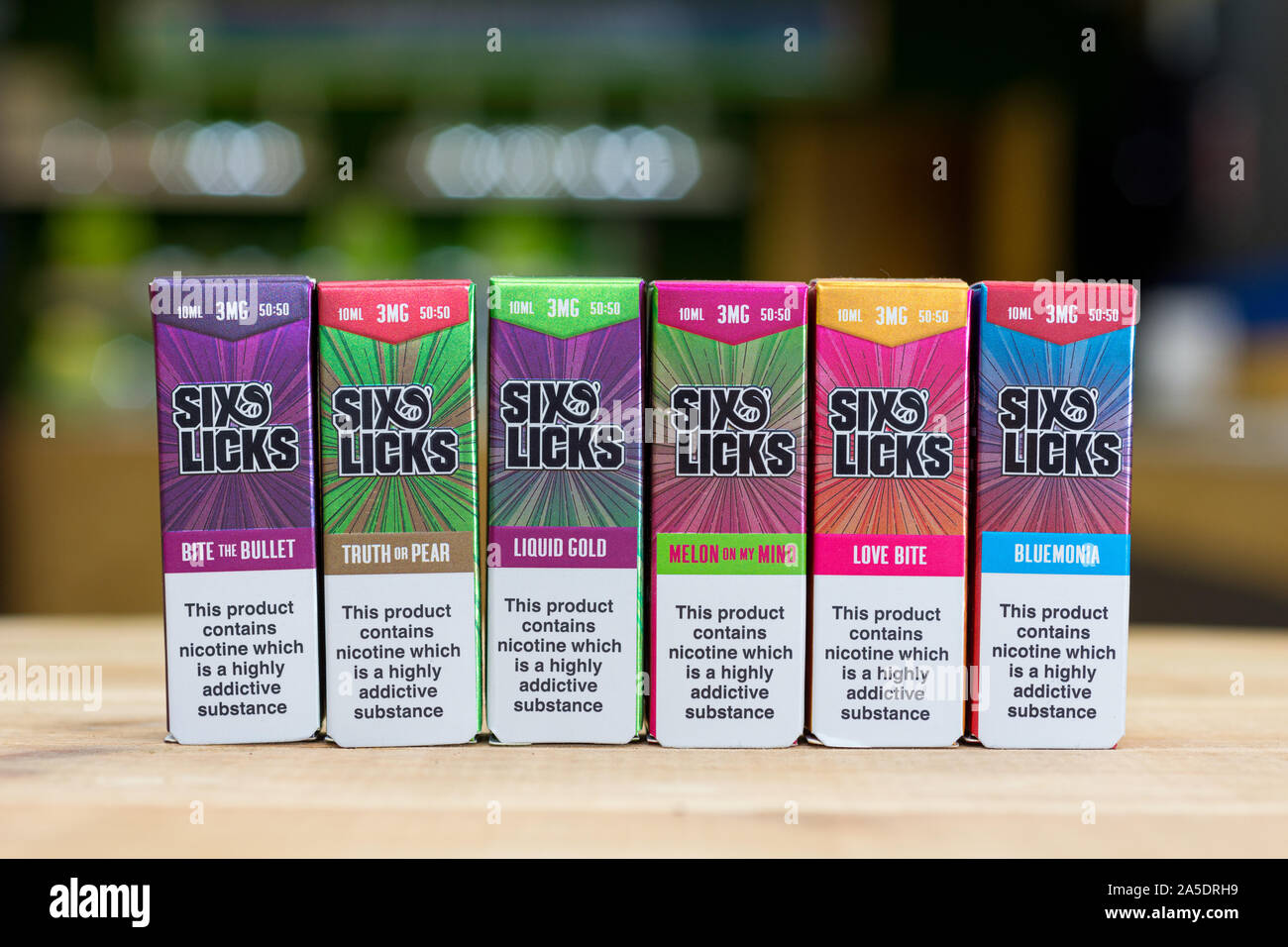 Six Licks 10ml short-fill e-liquid on display inside a Scottish vape shop Stock Photo