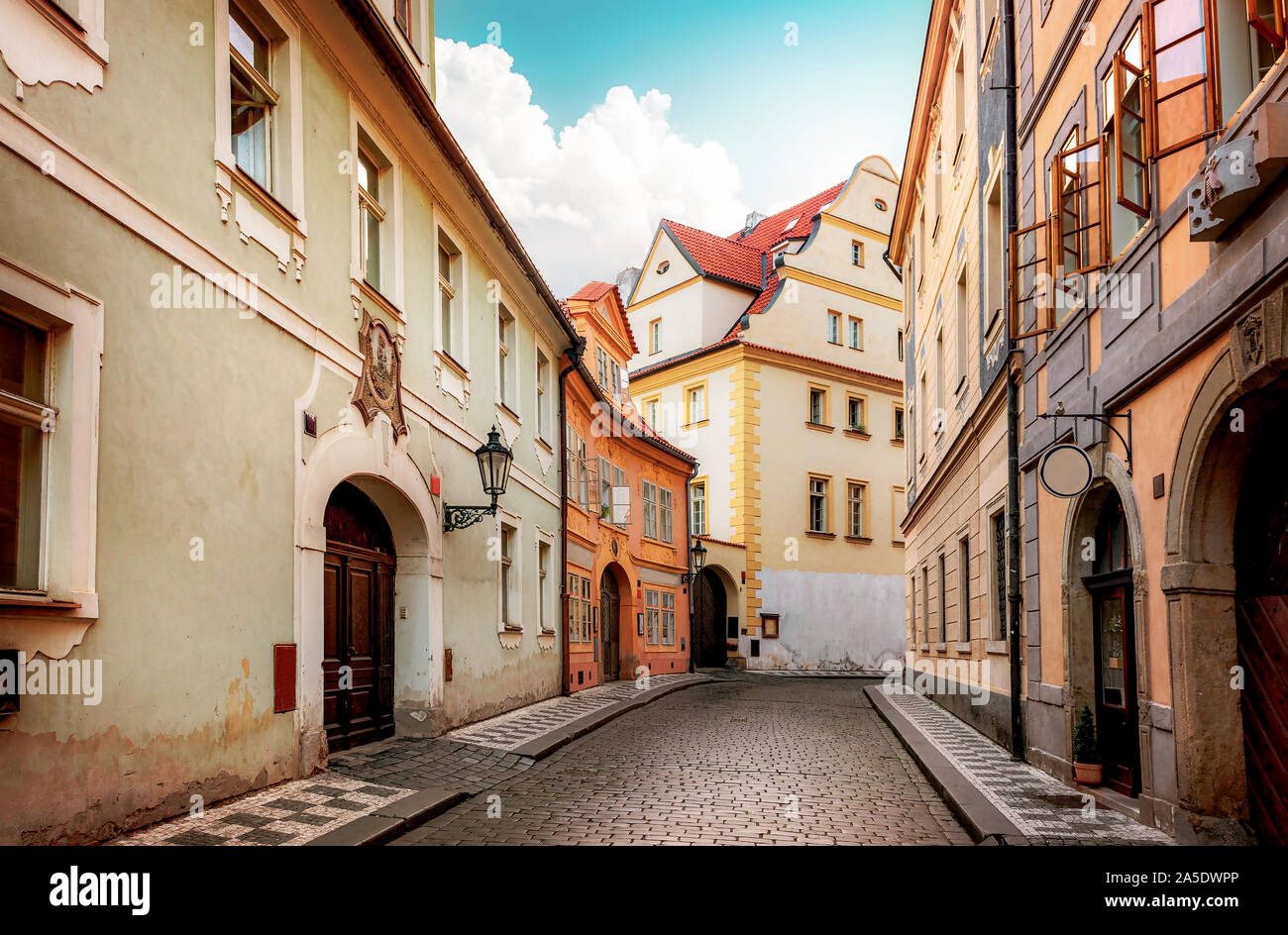 Old narrow street of Prague at dawn Stock Photo