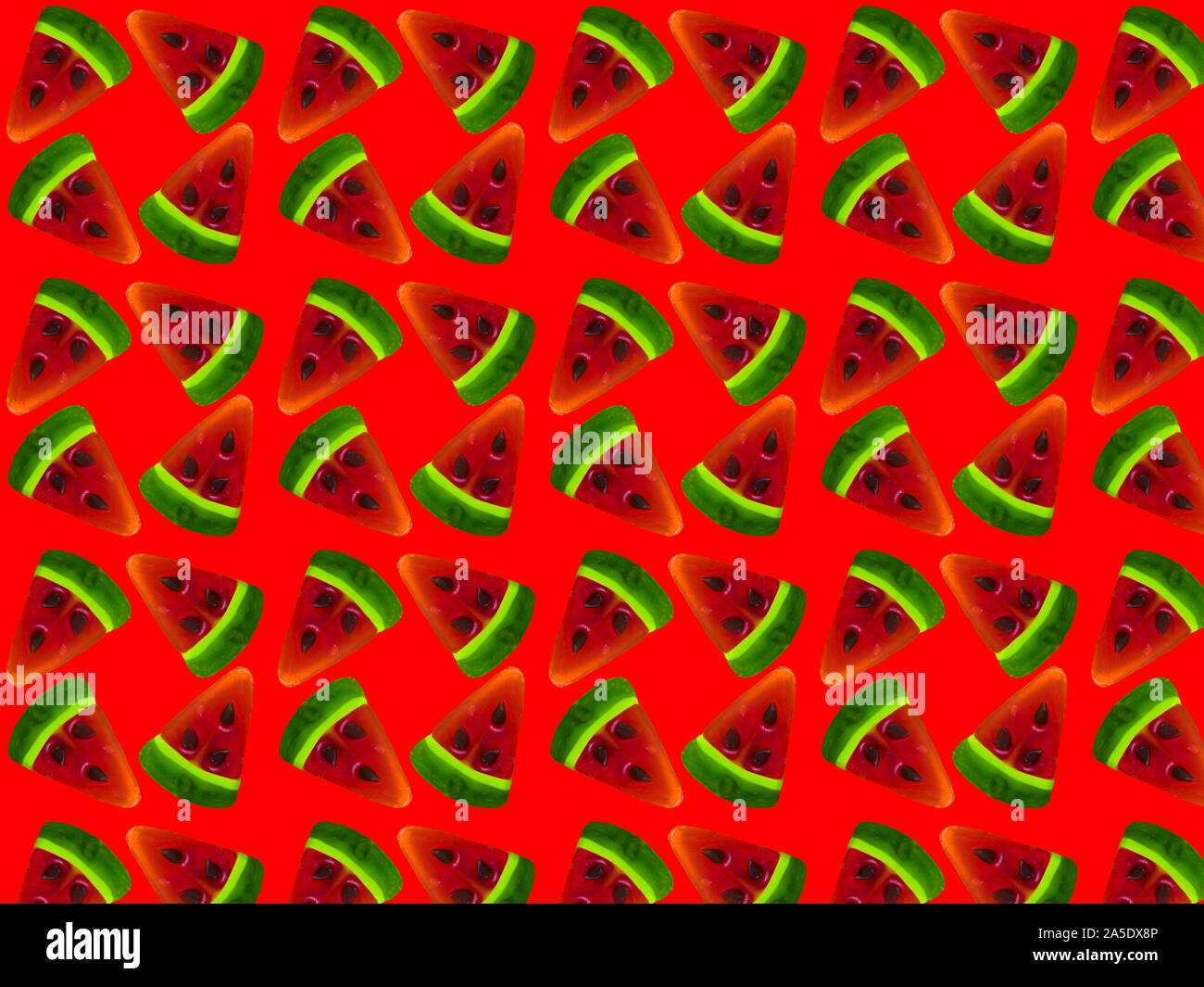 Seamless pattern from slices of watermelon on a red background. Print ...