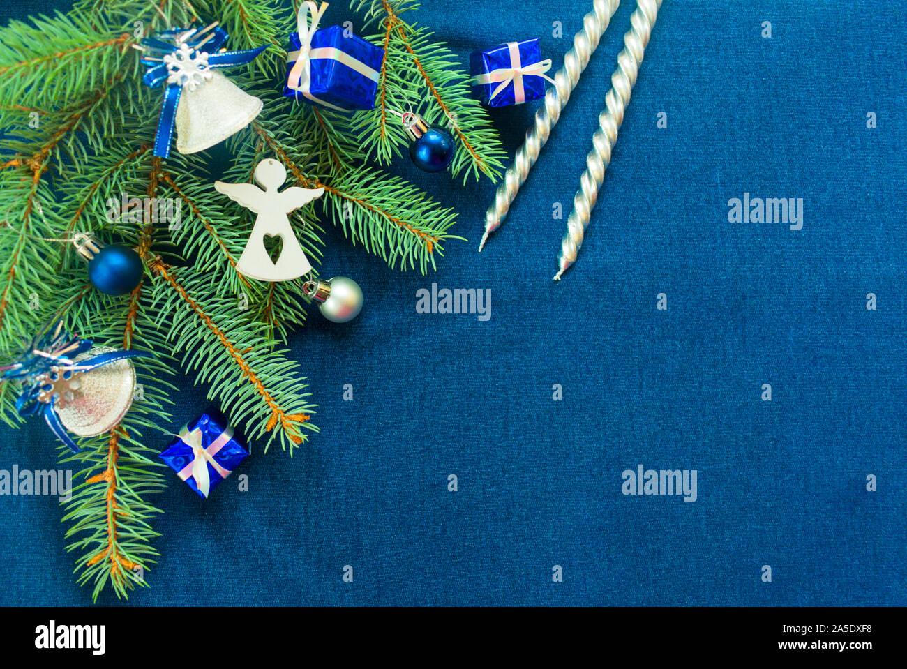 A white angel mannequin with white Christmas tree and cage Stock Photo -  Alamy