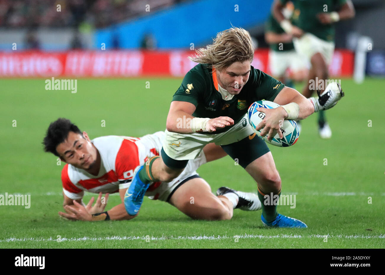 South Africa's Faf de Klerk scores his side's second try during the ...