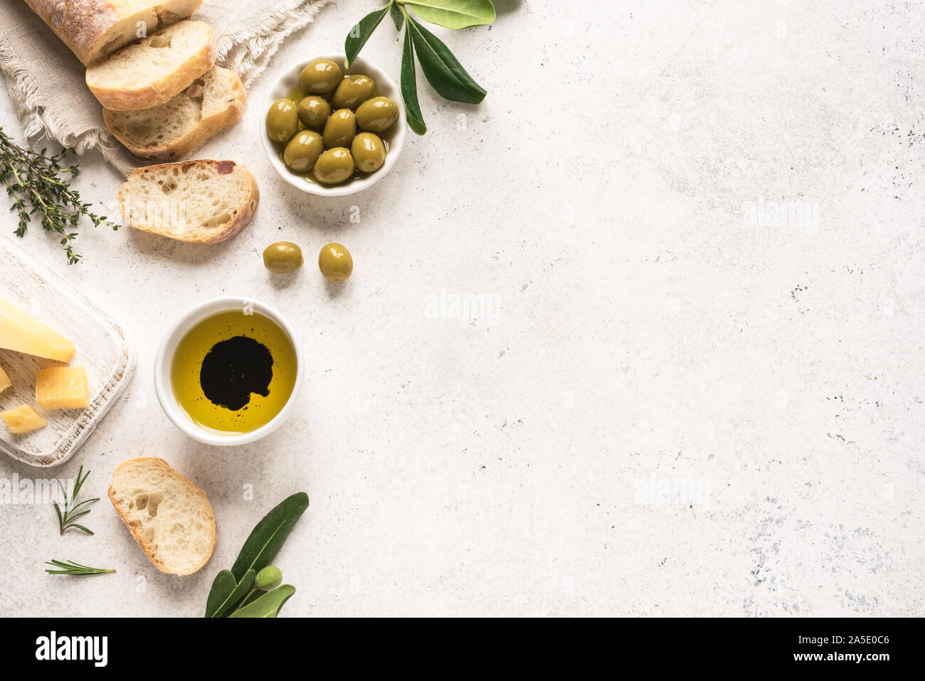Mediterranean food background. Fresh italian ciabatta bread with herbs
