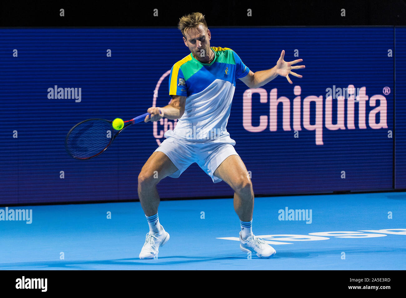 St. Jakobshalle, Basel, Switzerland. 20th Oct, 2019. ATP World Tour Tennis,  Swiss Indoors; Peter Gojowcczyk (GER) returns during the match against  Casper Ruud (NOR) - Editorial Use Credit: Action Plus Sports/Alamy Live