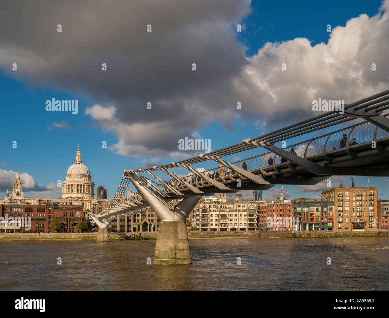 St Paul's Cathedral and Millennium Bridge  over River Thames, London, UK. Stock Photo