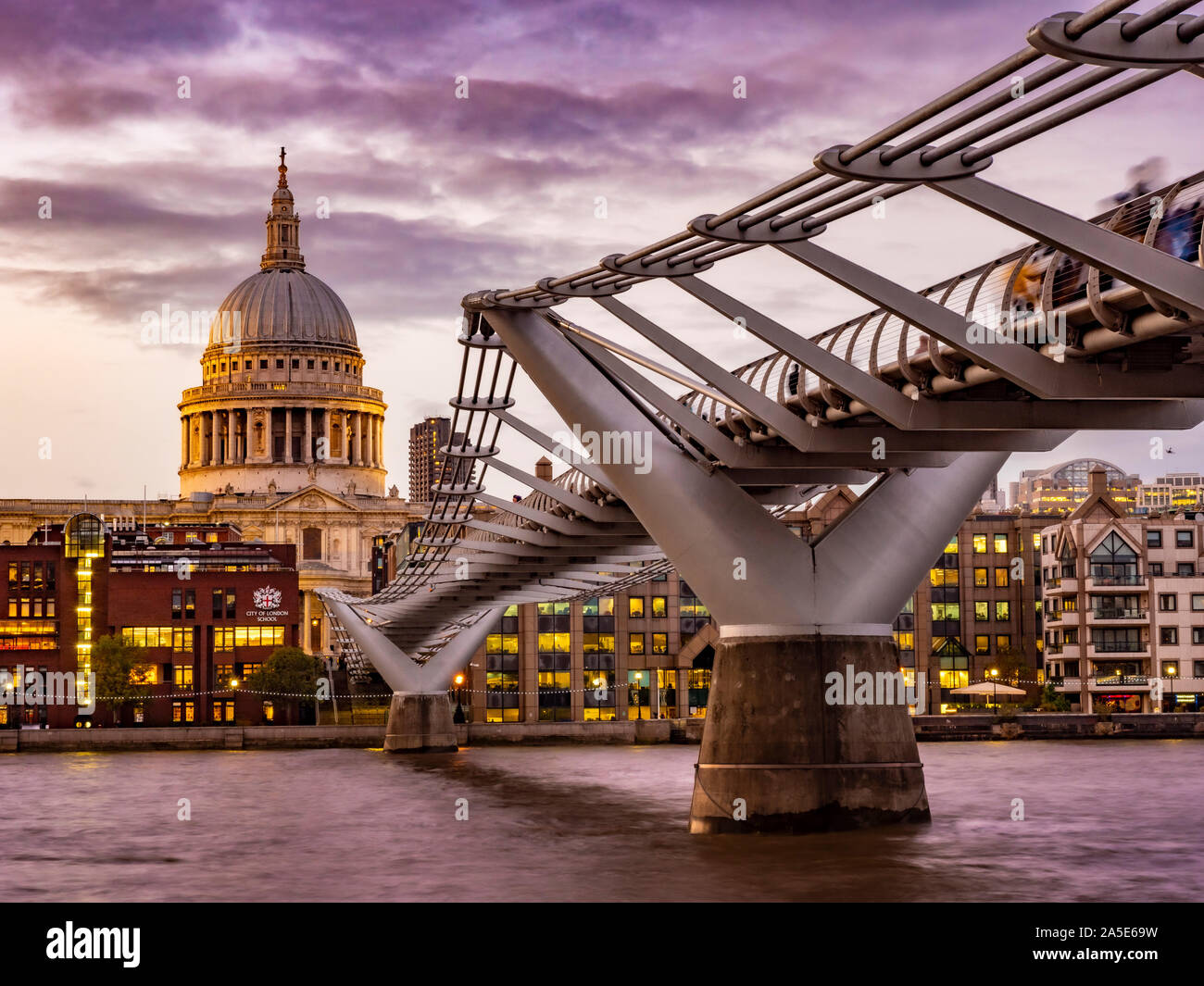 St Paul's Cathedral and Millennium Bridge over River Thames, London, UK. Stock Photo