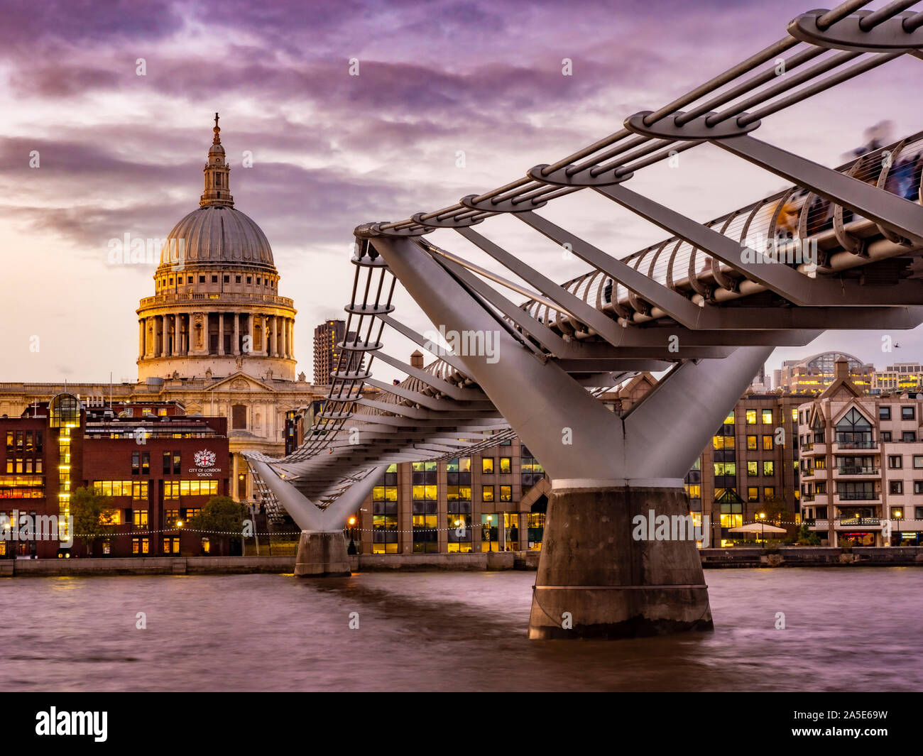 St Paul's Cathedral and Millennium Bridge  over River Thames, London, UK. Stock Photo