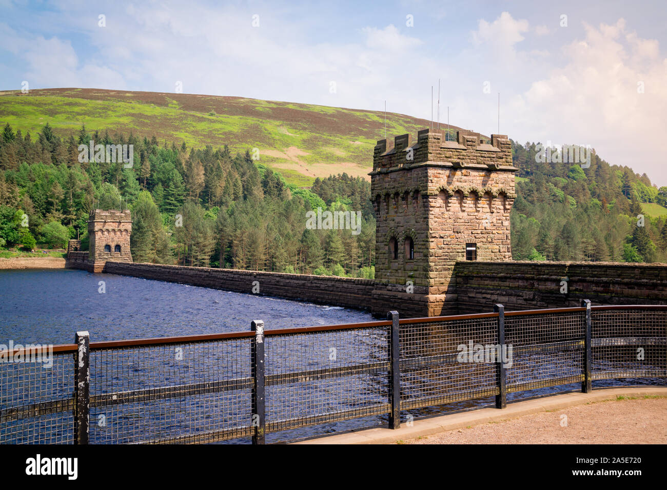 Top of the Derwent Dam and Reservoir with the twin Victorian neo-gothic towers Stock Photo
