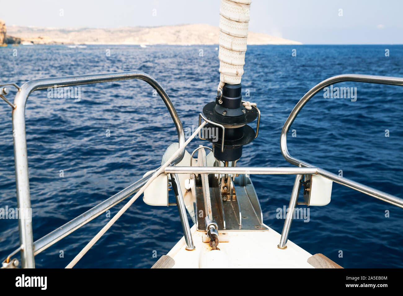Sailing yacht bow with jib furler and anchor Stock Photo