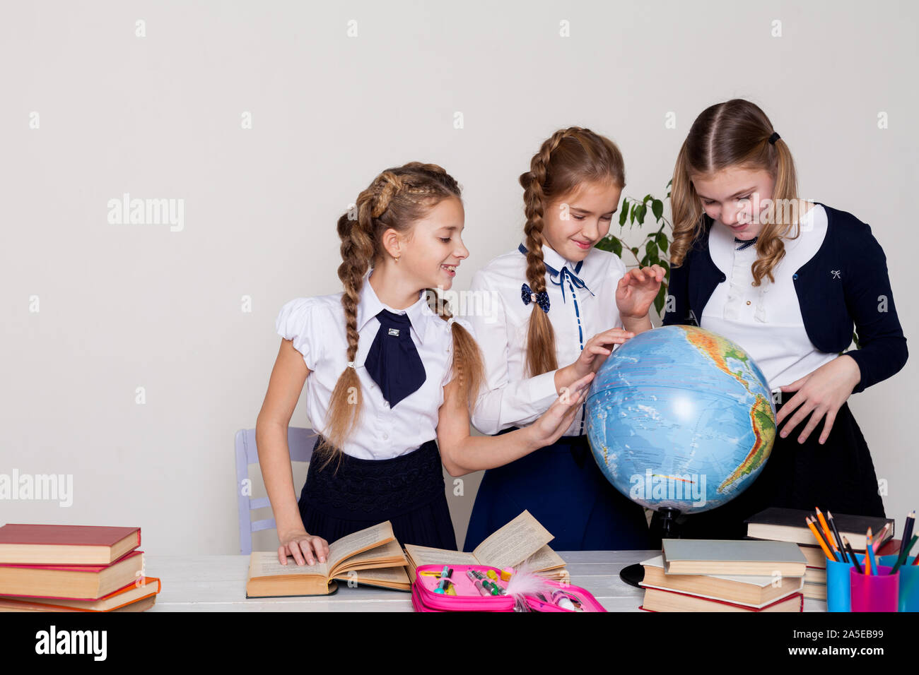 Indian school girls reading book hi-res stock photography and images ...