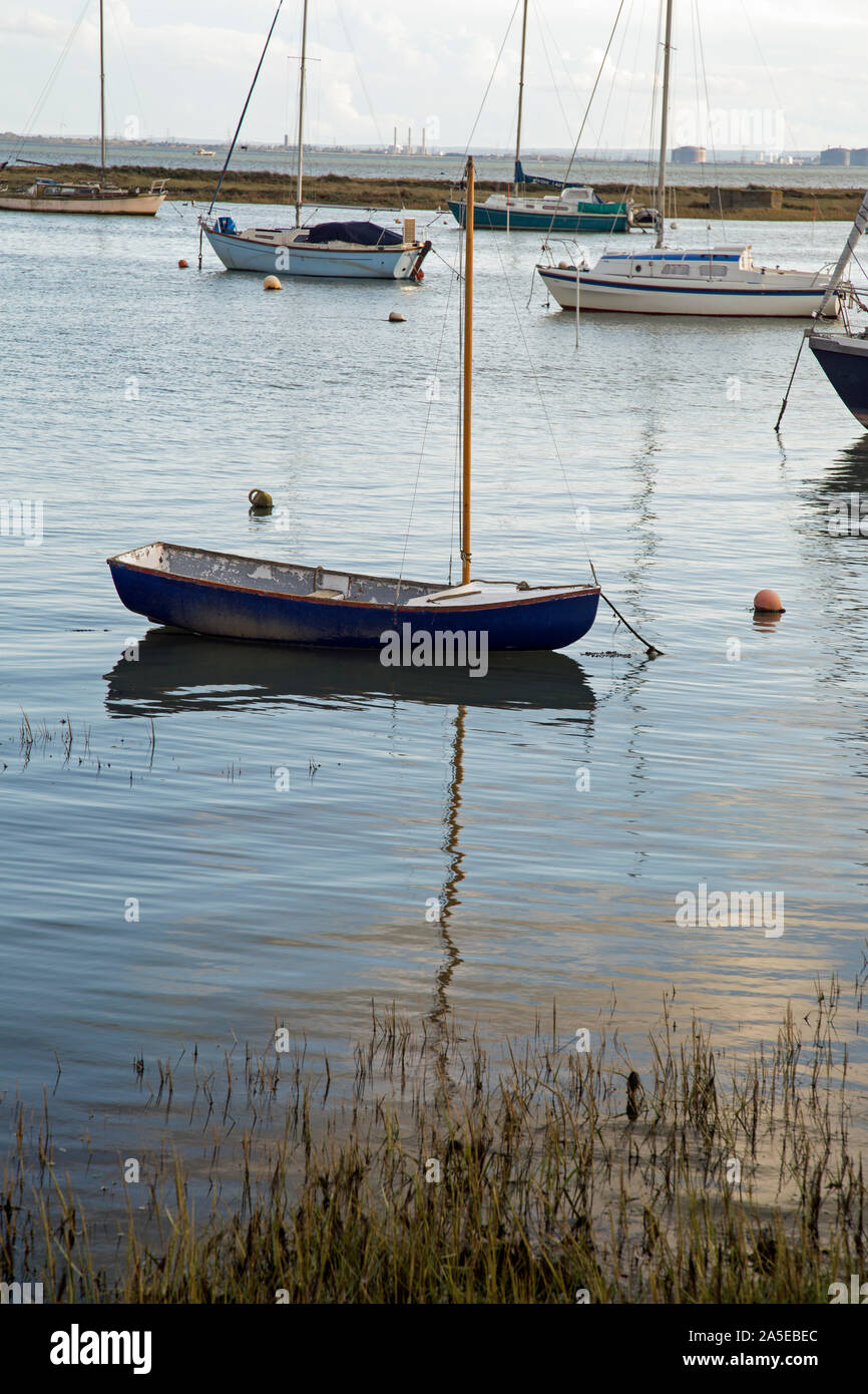 Leigh On Sea, Essex, England, October 2019, small rowing boats moored in shallow water. Stock Photo