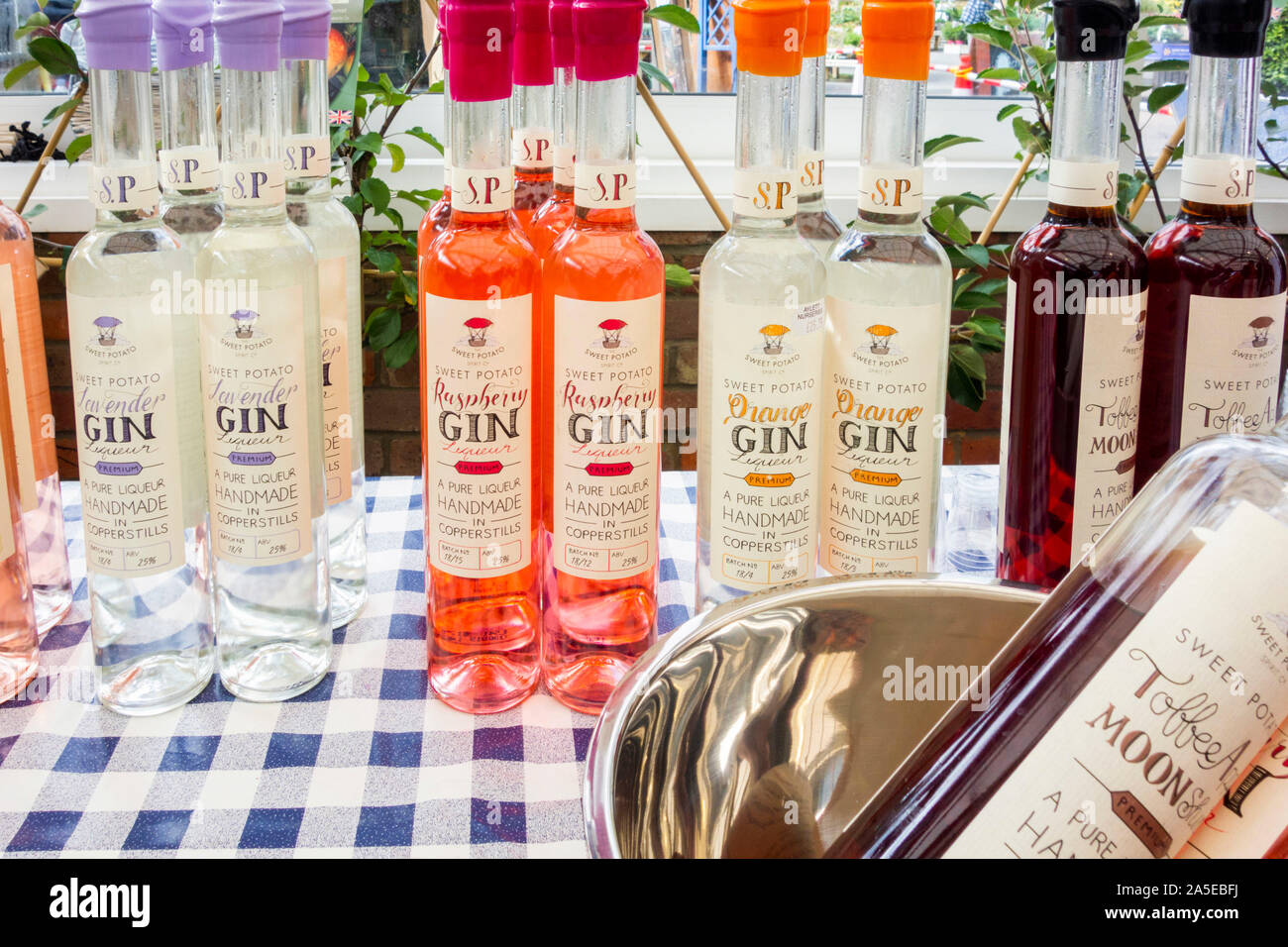 Bottles of different flavours of Handmade Gin Liqueur Stock Photo Alamy