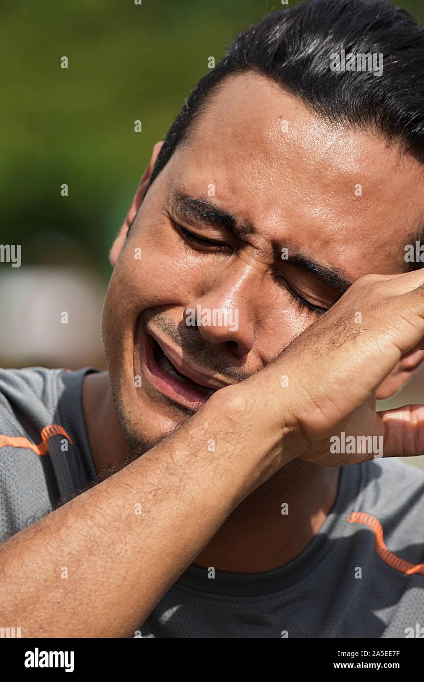 Tearful Athletic Man Stock Photo