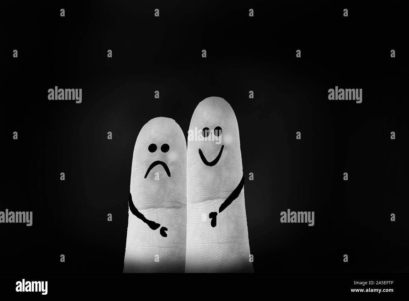 Two Friends In The Dark One Comfort The Other Fingers Painted Face Creative Background Concept Stock Photo Alamy