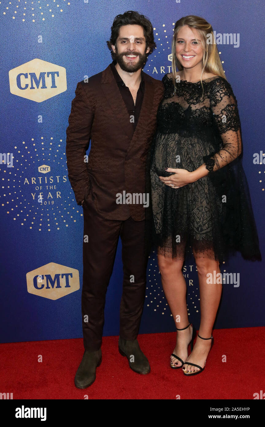 Thomas Rhett (L) and Lauren Akins attend the 2019 CMT Artists of the Year at Schermerhorn Symphony Center on October 16, 2019 in Nashville, Tennessee. Stock Photo