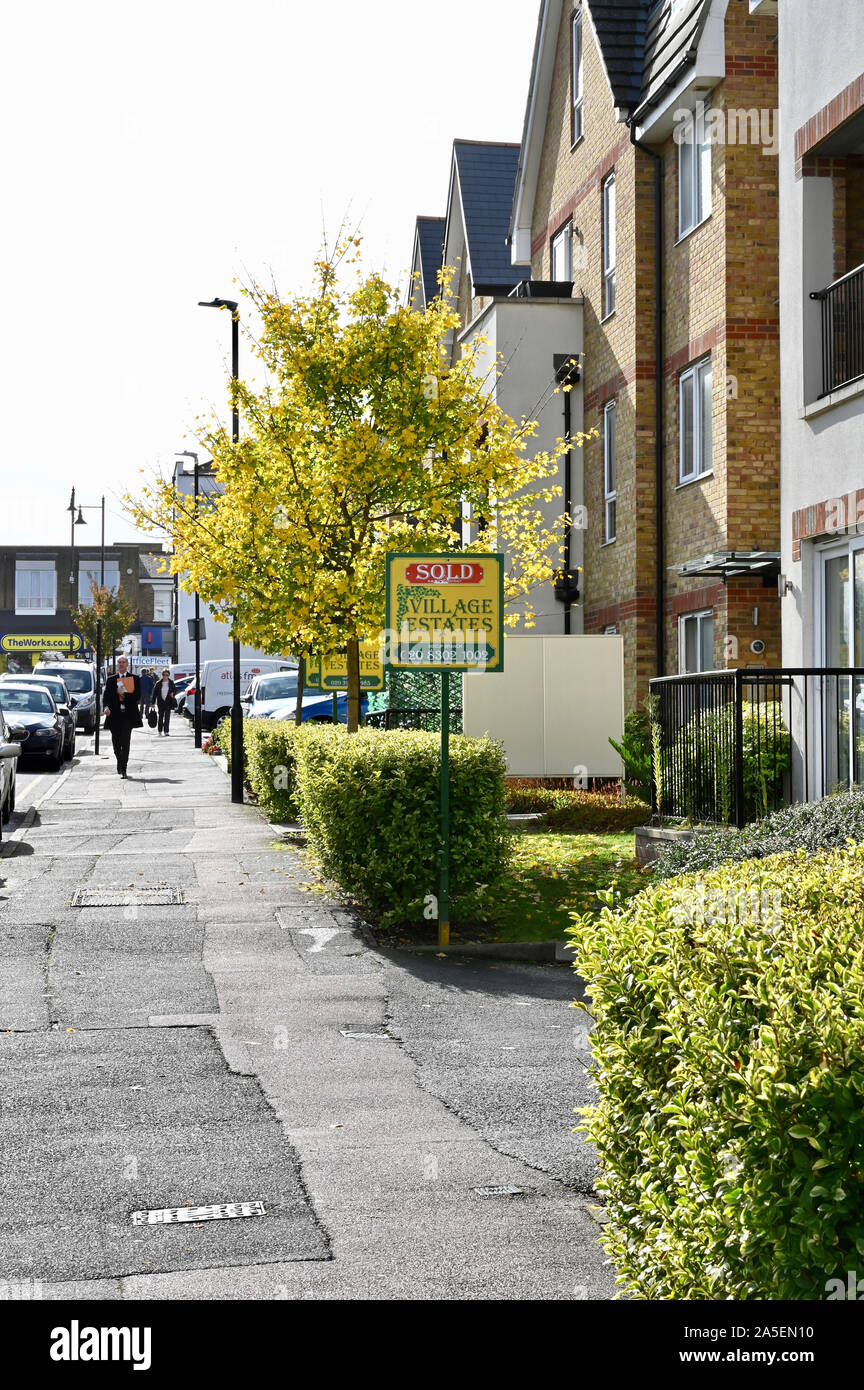 Sold Property. Street in Sidcup with an Estate Agent's Sold Sign visible. Sidcup, Kent. UK Stock Photo