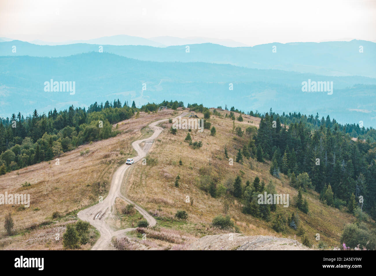 off road car travel by mountains peak autumn season Stock Photo