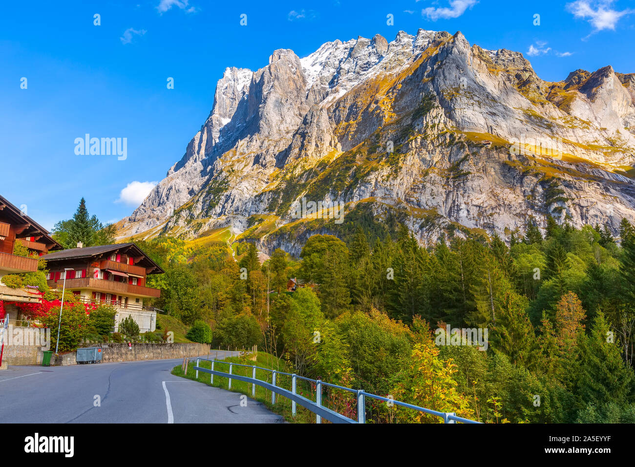 Grindelwald, Switzerland street and autumn Swiss Alps mountains