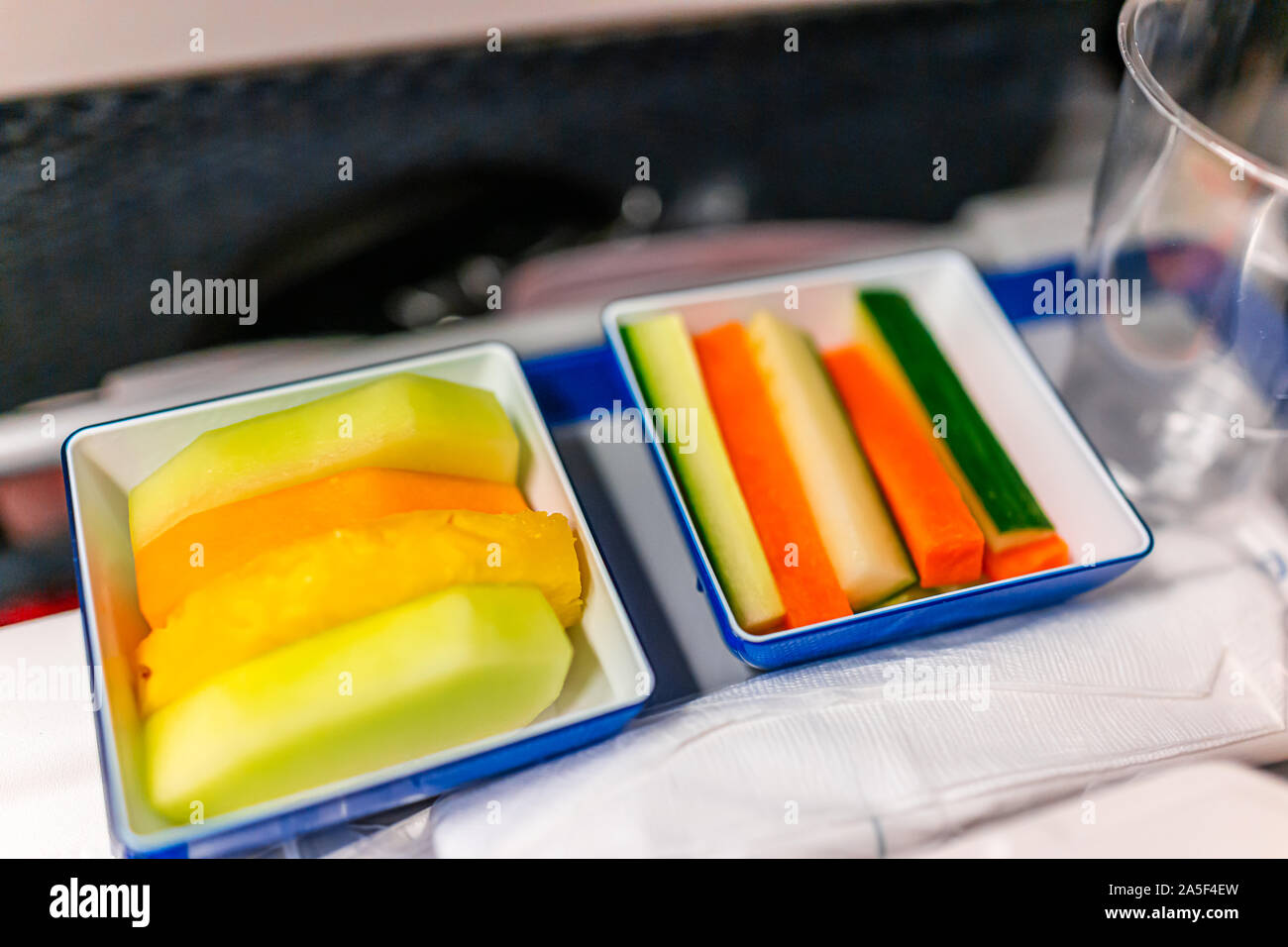 Healthy vegan food vgml snack meal on airplane flight with dessert