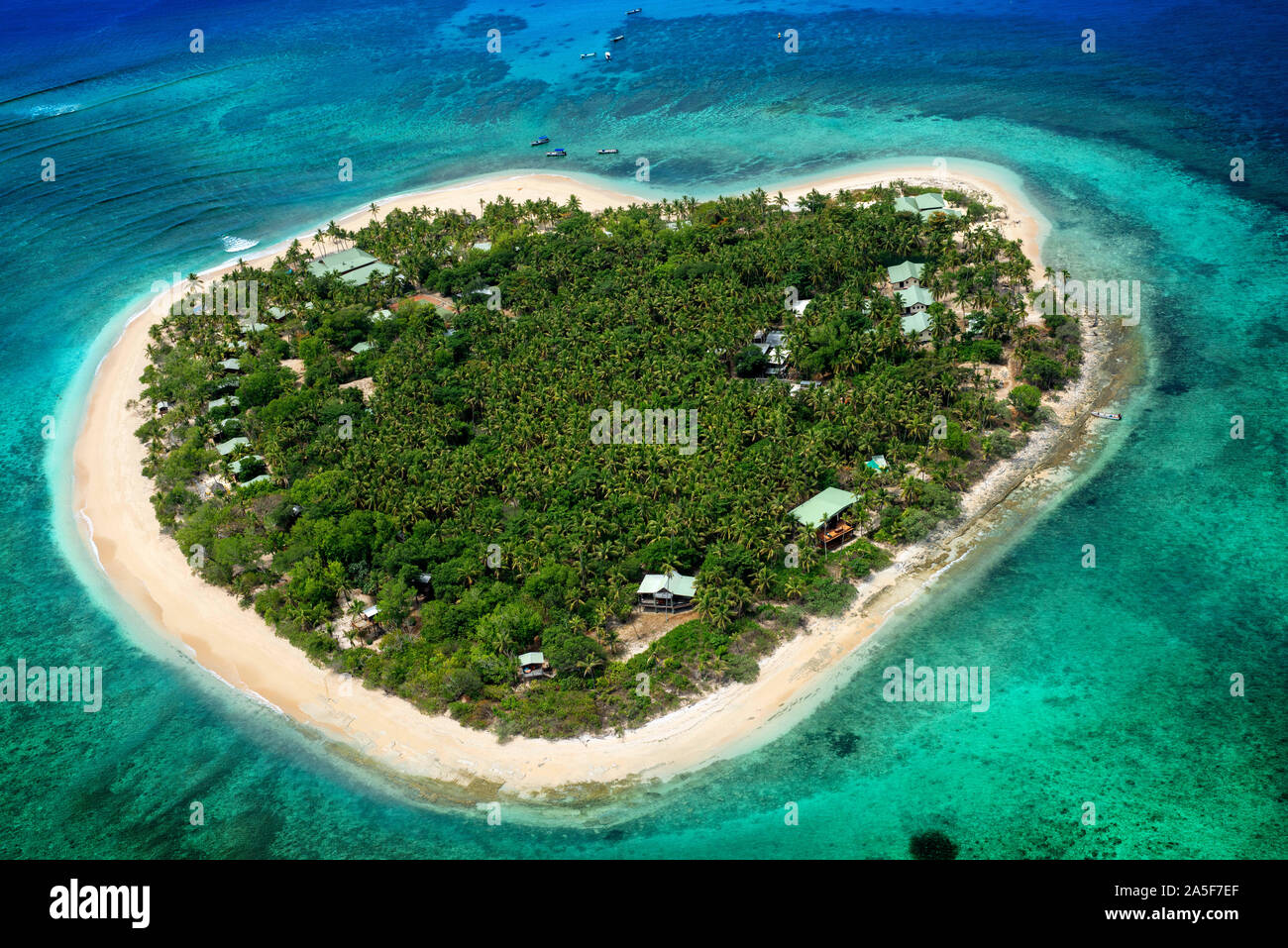 Aerial view of the heart-shaped island of Tavarua, near Viti Levu, Republic of Fiji, South Pacific Islands, Pacific Stock Photo