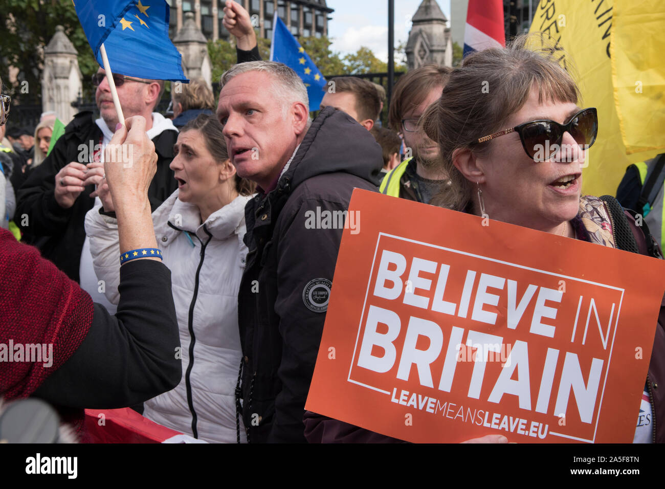 Brexit group of Leavers argue with EU flag waving Brixiteer on  Super Saturday 19 October 2019  Parliament Square London UK. HOMER SYKES Stock Photo