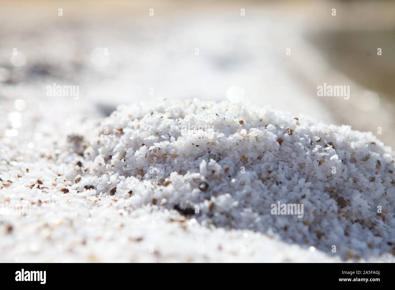 Dead sea salt on the beach - Salt accumulation on the Dead Sea shore in Israel Stock Photo